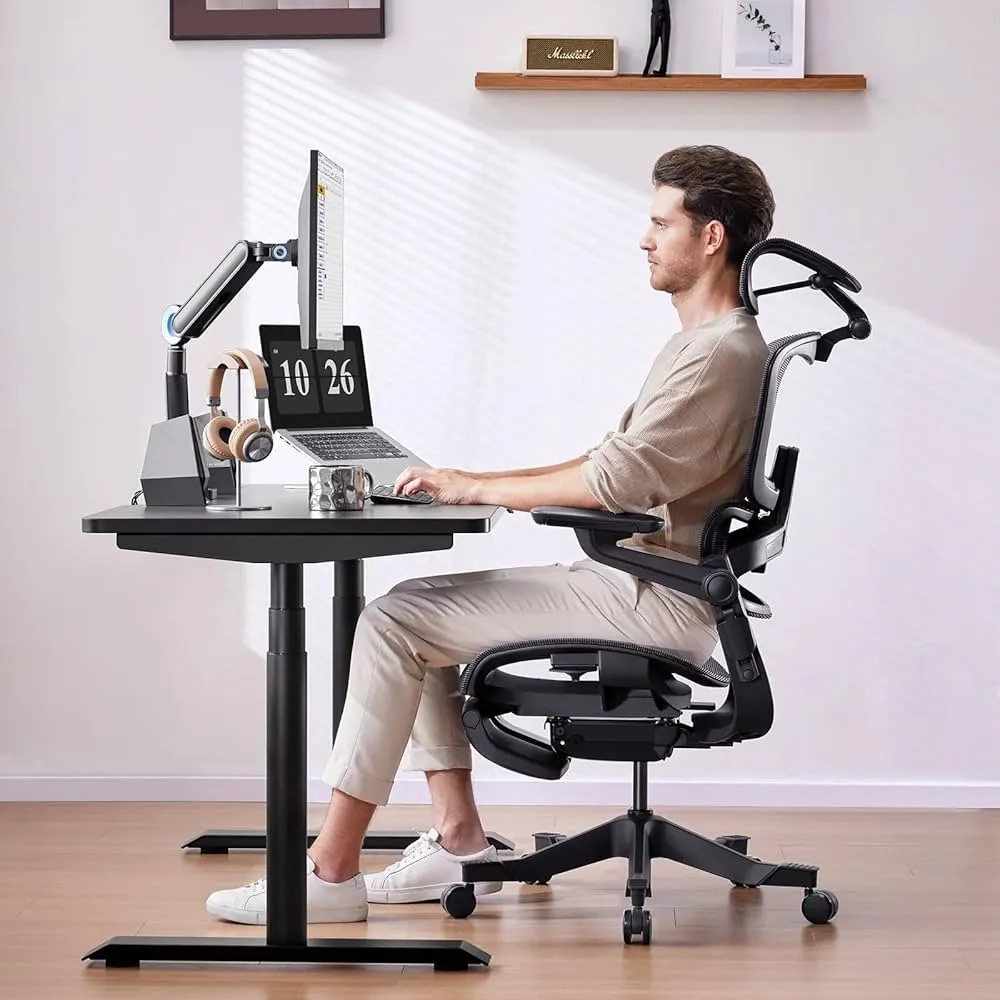 A close arrangement of light and shadow on a workspace surface